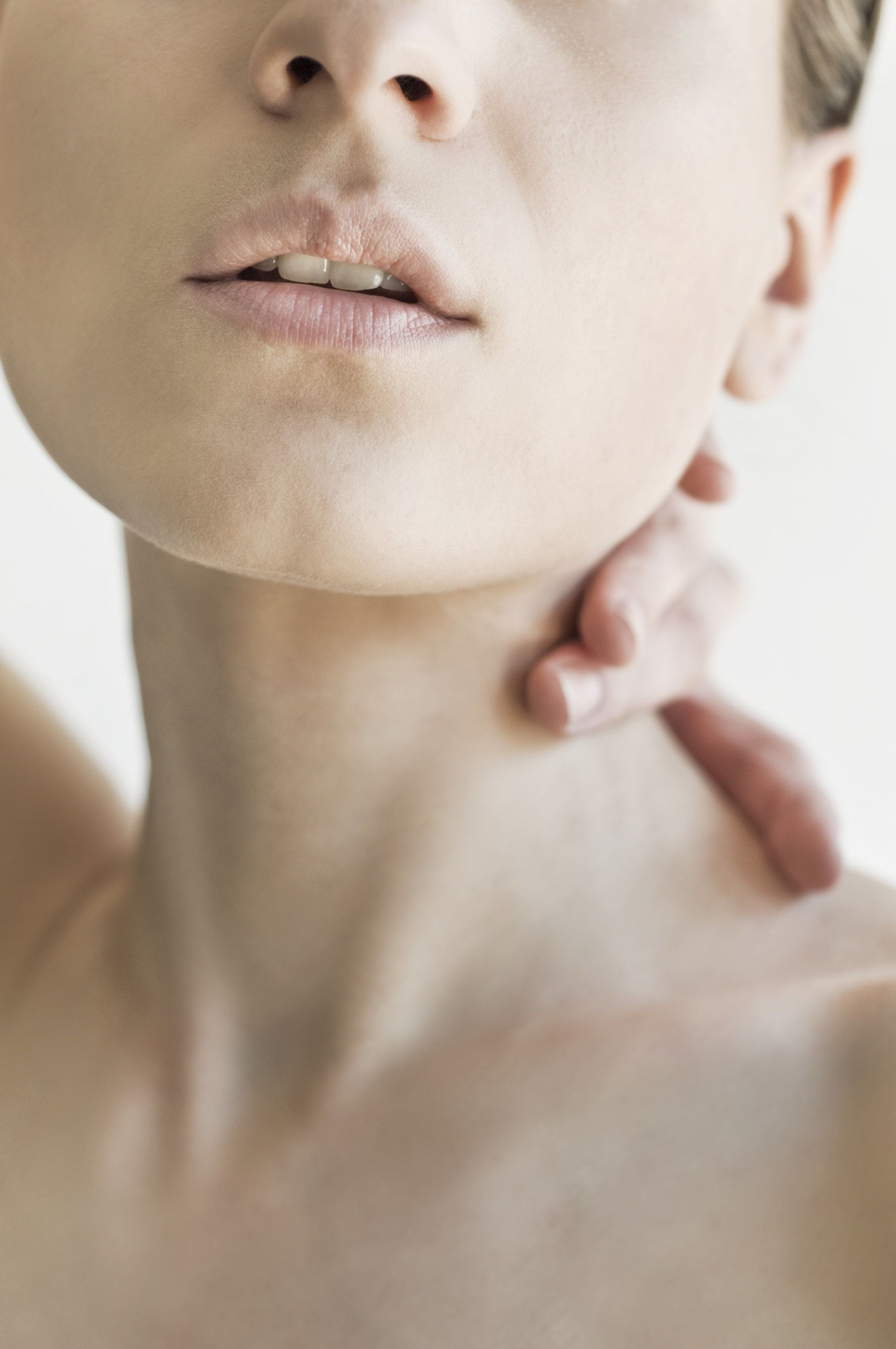 Photo of a woman's chin and neck